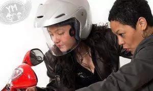 Mother and Daughter Buying a Motorcycle