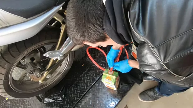 Siphoning gas out of the Kawasaki Ninja 650 rebuild bike