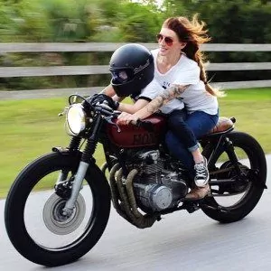 Mother and Son Riding a Honda Motorcycle