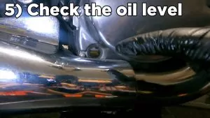 Suzuki Savage 650 S40 oil and filter change - step 5 check oil level