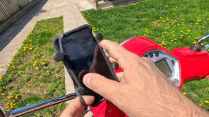 cell phone mounted on a vespa