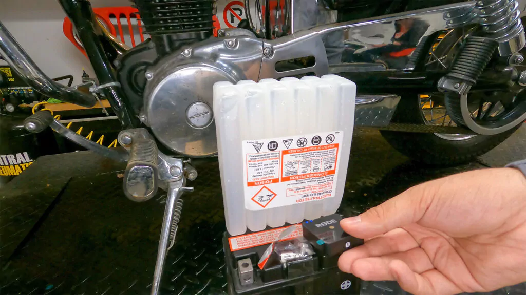 Filling a motorcycle battery with acid. The mic is recording the sounds of the acid bubbling.