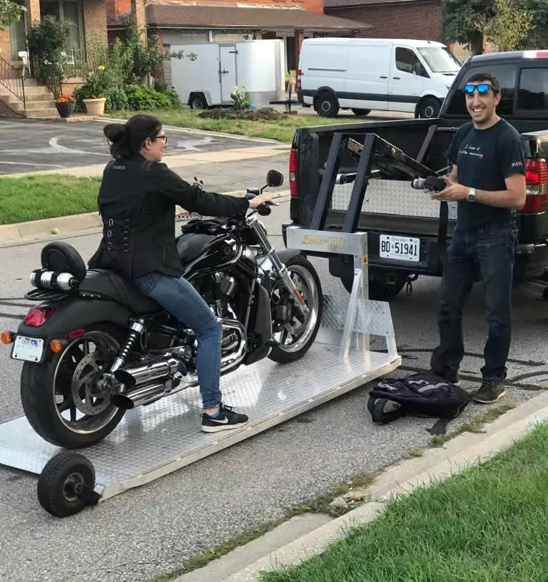 motorcycle being loaded to be towed in toronto